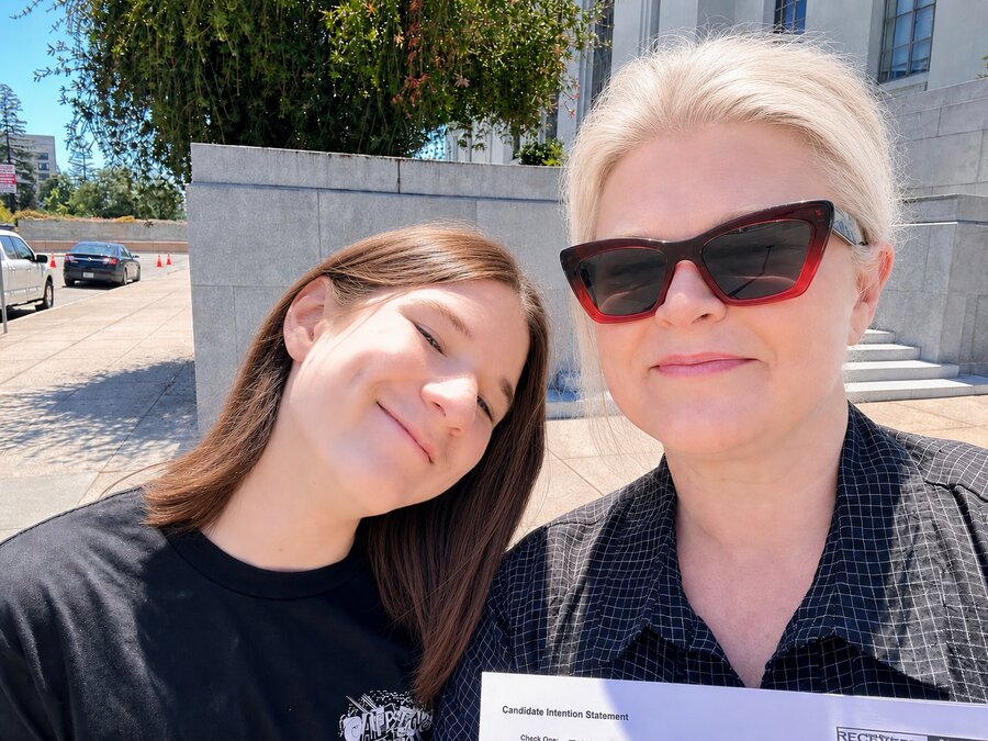 Myla Long with her child after filing her candidate intention statement